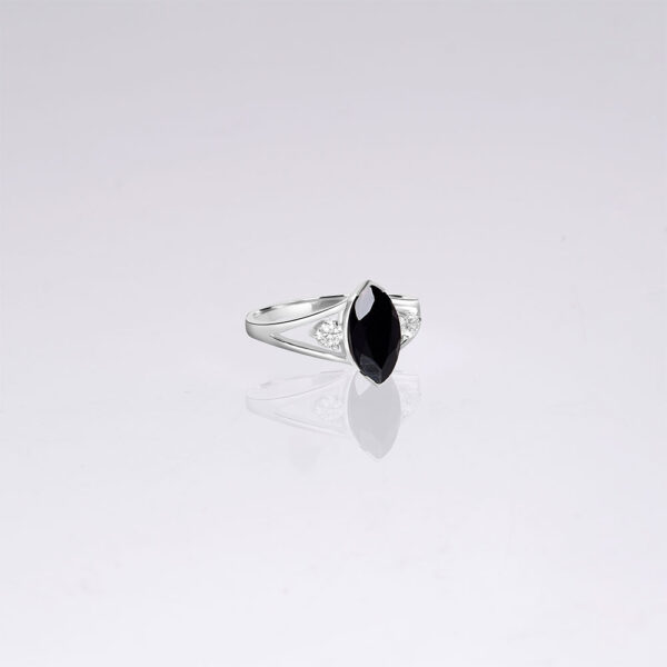 black onyx engagement white gold ring with side diamonds
