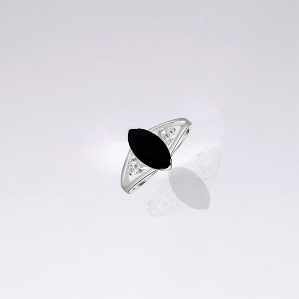 black onyx engagement white gold ring with side diamonds