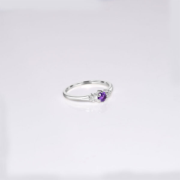 Dainty Tanzanite 14k white gold  with side diamonds