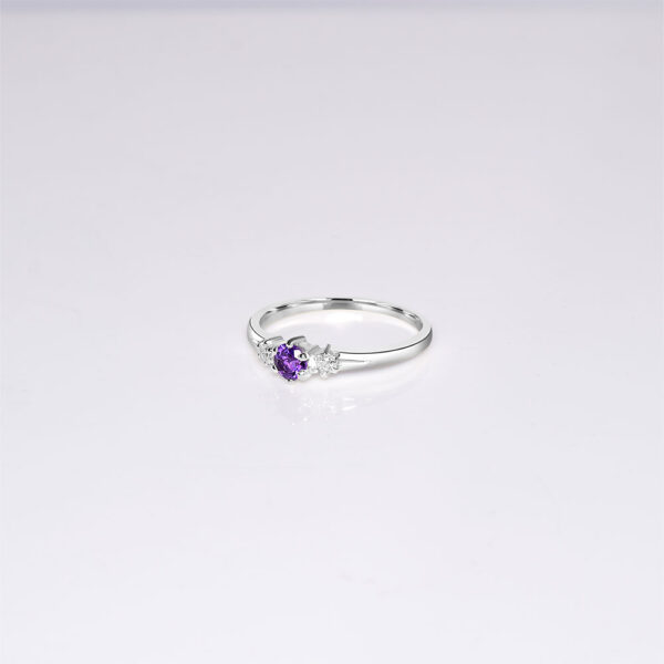 Dainty Tanzanite 14k white gold  with side diamonds